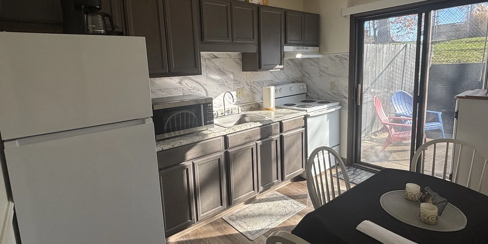 Amherst Meadow Apartments fully renovated kitchens with great light, patio access